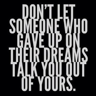 A black square background containing bold, white, capitalized text arranged in a block format. The text forms a motivational quote.