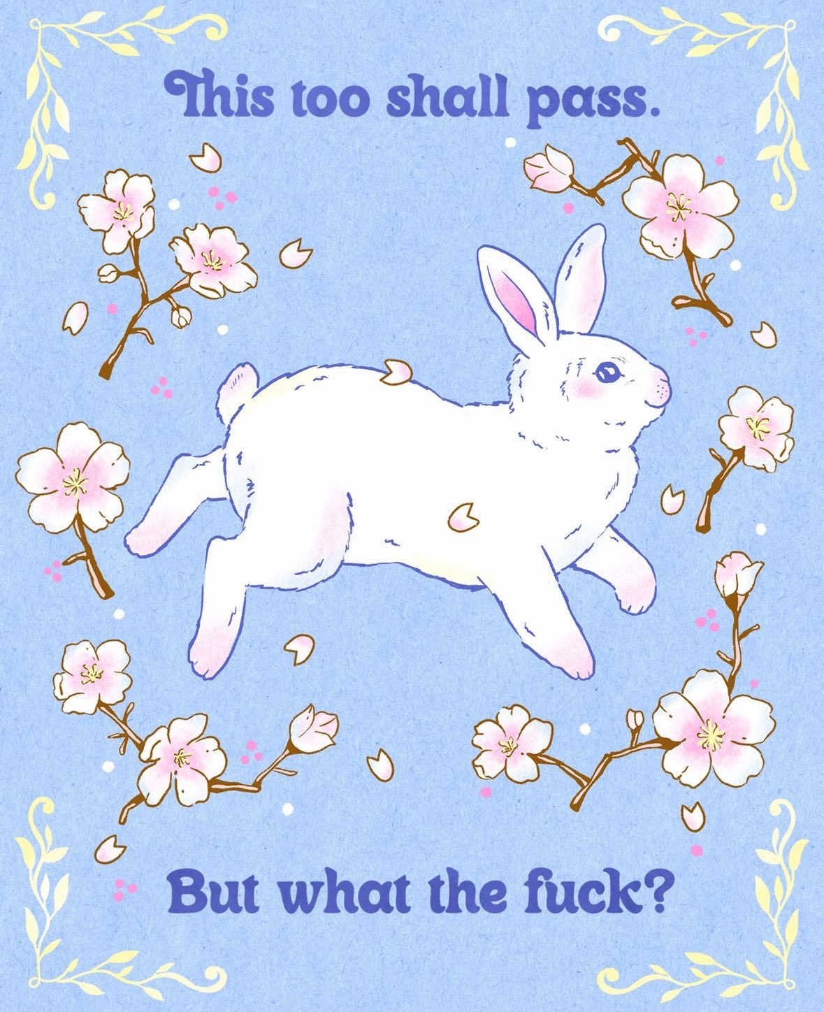 A whimsical and humorous illustration on a light blue background. In the center, a white rabbit is depicted mid-leap or floating. The rabbit is surrounded by branches of pink cherry blossoms and falling petals. The entire scene is framed by delicate yellow floral corner flourishes. At the top, there is text that reads 'This too shall pass.', and at the bottom, there is text that reads 'But what the fuck?'