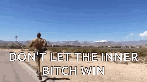 A man is running down a desert road towards mountains in the distance under a clear blue sky. Large white text is overlaid on the bottom half of the image.