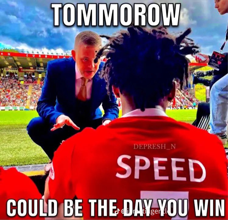 A meme featuring a man in a dark blue suit crouching and gesturing toward a person with dark dreadlocks wearing a red jersey. The jersey has the name 'SPEED' printed on the back. The background shows a crowded football stadium under a blue sky. Large white text is overlaid on the image.