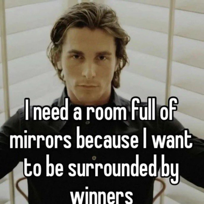 A meme featuring a close-up photograph of actor Matthew McConaughey looking directly into the camera with a serious expression. Superimposed over the image is large, white, sans-serif text that reads: 'I need a room full of mirrors because I want to be surrounded by winners'.