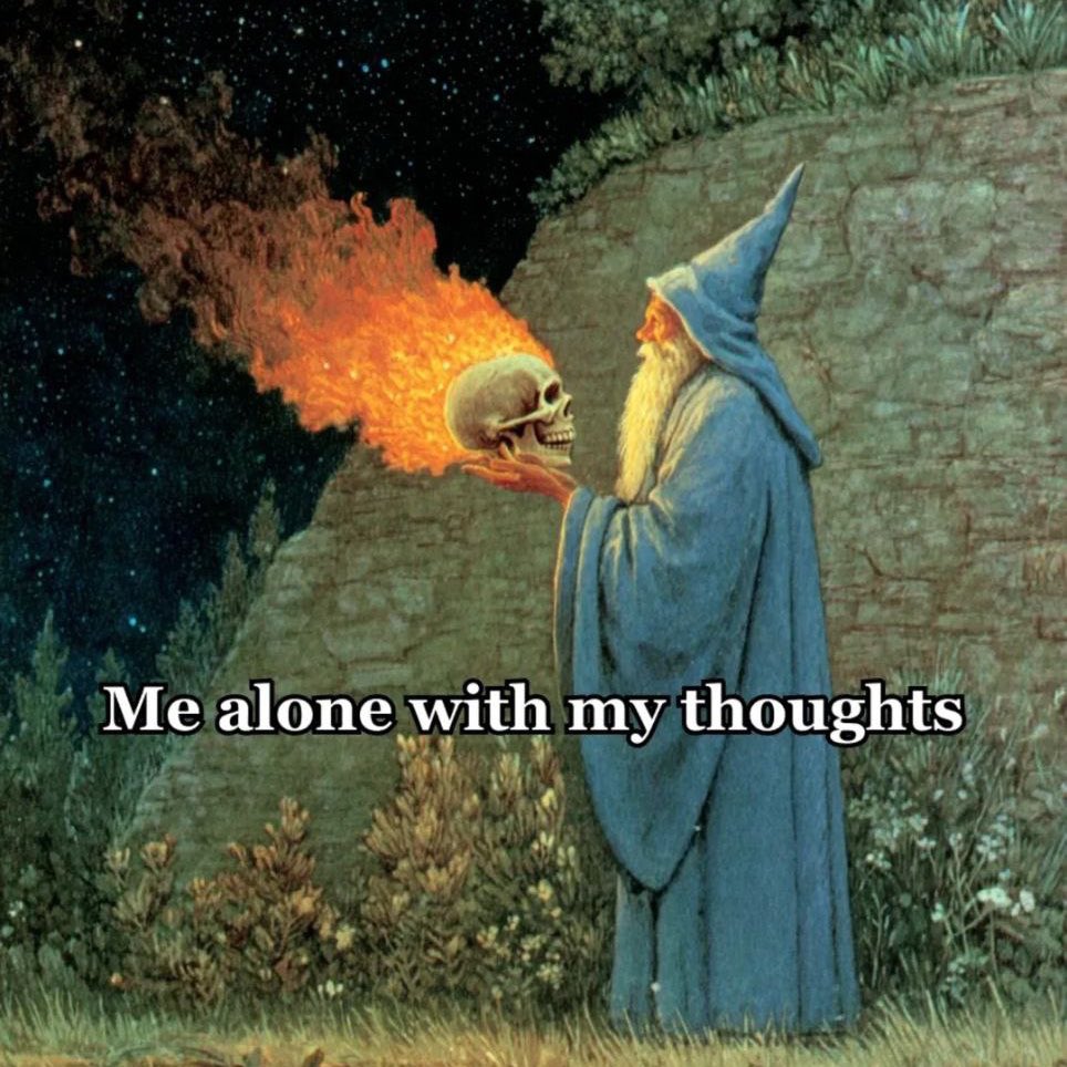 A surreal fantasy painting depicting an elderly wizard with a long white beard and a blue pointed hat and robe. He is holding a human skull that is emitting a large plume of orange and yellow flames into a dark, starry night sky. The wizard is standing near a stone wall and some foliage. The image features meme text overlaid on the bottom half.