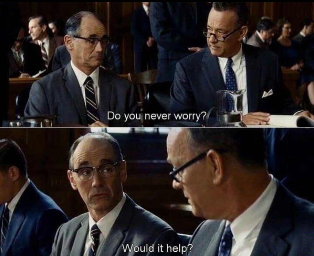 A two-panel meme featuring two men in business suits sitting in what appears to be a courtroom or formal hearing setting. The top panel shows a man on the right (played by Tom Hanks) looking at the man on the left and asking a question. The bottom panel shows a close-up of the two men, with the man on the right responding to the first question. The scene is from a film and is formatted as a dialogue meme.